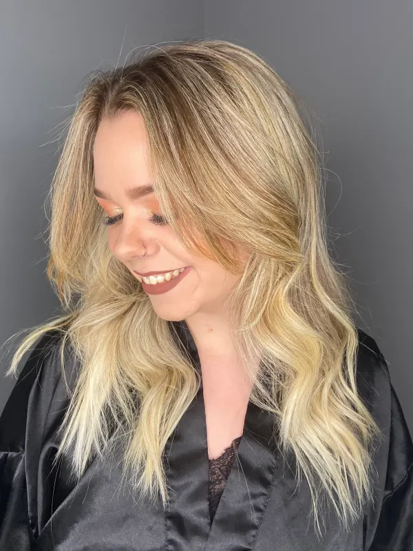 Soft buttery blonde, hand painted so the highlights never read as stripes