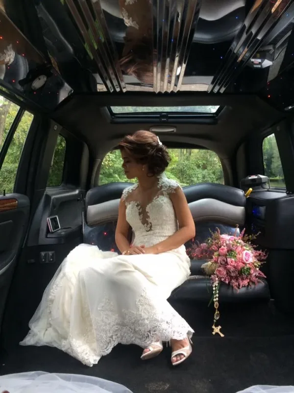 Bridal updo worn in the car on the way to the ceremony