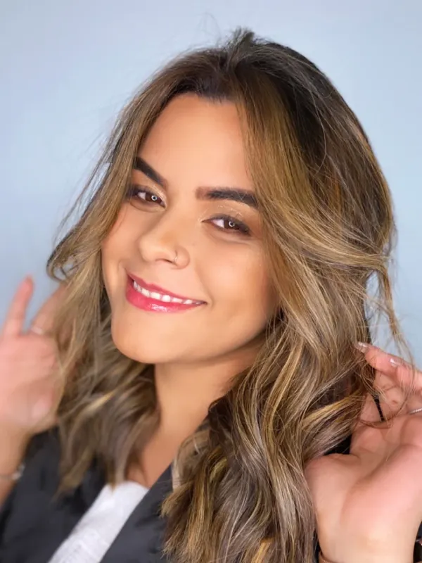 Warm brunette lifted with soft highlights around the face