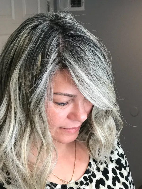 Silver blonde kept cool against a deliberately dark root