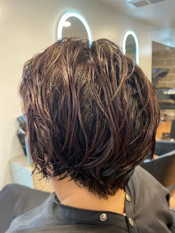 Short layered bob from the back, stacked at the nape to hold its shape