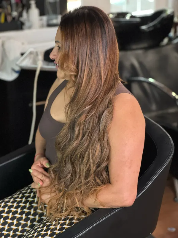 The same length from the side, cut to fall with the natural hair